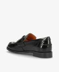 Sort laklæder loafer fra Shoedesign Copenhagen set fra siden med brun indersål og lav sort hæl.