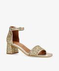 Guldglitrende sandal med blokhæl og ankelrem fra Shoedesign Copenhagen.
