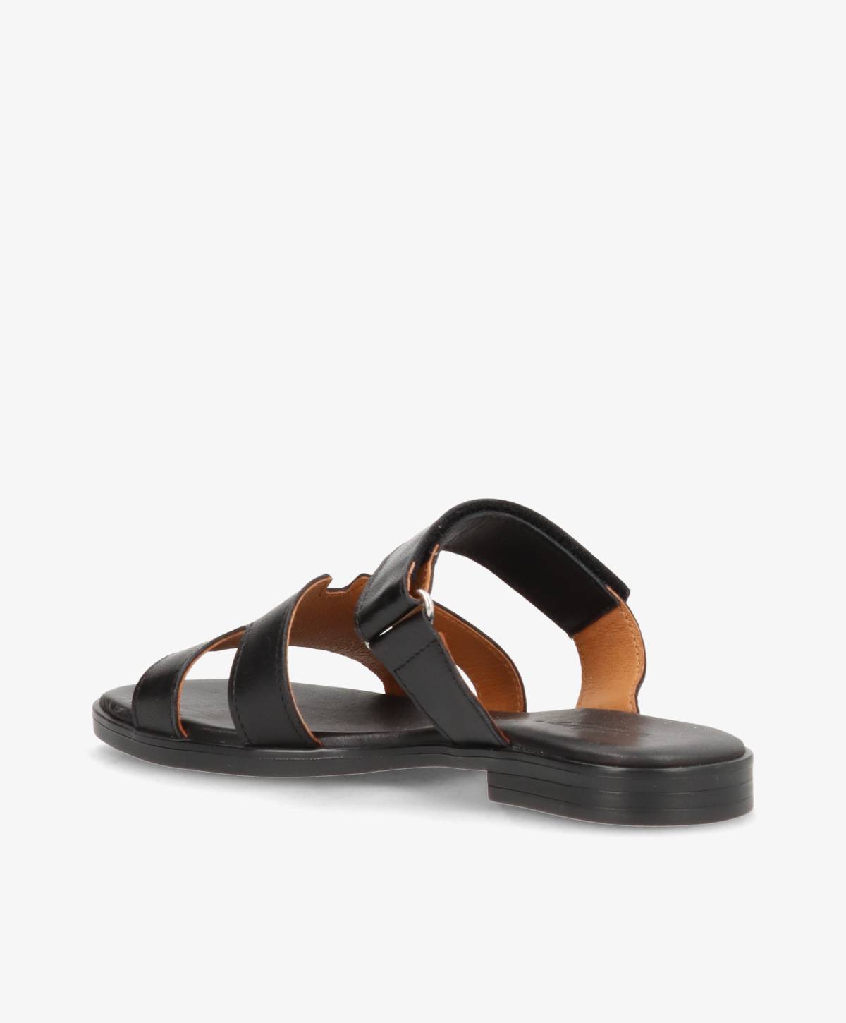 Sort læder sandal fra Shoedesign Copenhagen set bagfra, med justerbar rem og flad sål.