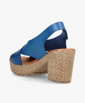 Blå sandal fra Shoedesign Copenhagen med kilehæl i flet og åben tå.