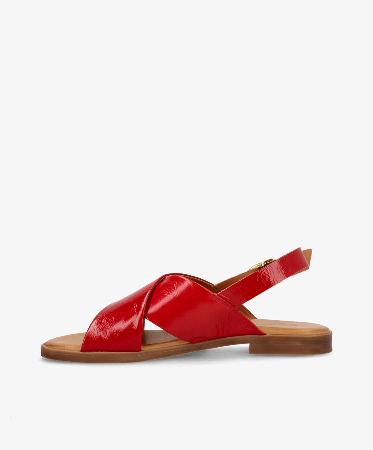 Rød læder sandal fra Shoedesign Copenhagen med krydsede stropper og flad sål.