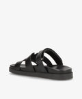 Sort læder sandal fra Shoedesign Copenhagen med flade såler og krydsede remme.