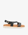 Sort lædersandal fra Shoedesign Copenhagen med justerbar rem og hvid sål.