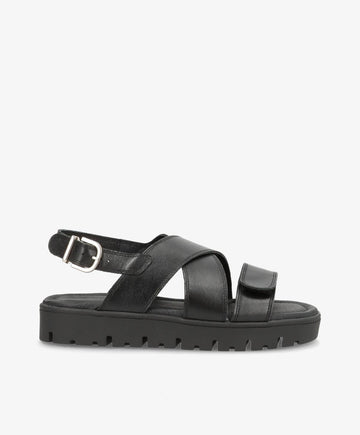 Sort lædersandal fra Shoedesign Copenhagen med justerbar rem og robust sål.