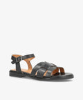 Sort lædersandal fra Shoedesign Copenhagen med justerbar rem og flad sål.