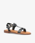 Sort lædersandal fra Shoedesign Copenhagen med justerbar rem og brun sål.