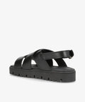 Sort lædersandal fra Shoedesign Copenhagen med justerbar rem og robust sål.