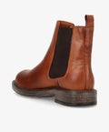 Brun læderstøvle fra Shoedesign Copenhagen med elastikpanel og robust sål.