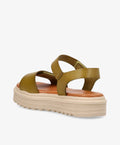 Sandaler fra Shoedesign Copenhagen i olivengrøn med tyk, beige sål og krydsende remme.