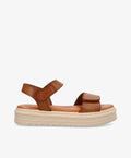 Skindsandal fra Shoedesign Copenhagen i cognac med velcroremme og cremefarvet bund.
