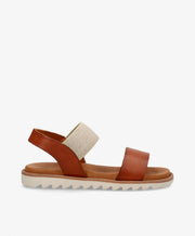 Brun lædersandal fra Shoedesign Copenhagen med elastisk rem og hvid sål.