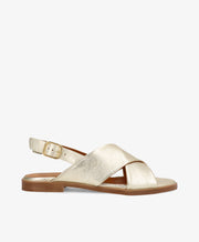 Guld sandal fra Shoedesign Copenhagen med krydsrem og justerbar spænde.