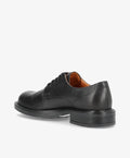 Sort lædersko fra Shoedesign Copenhagen set fra siden, med snørebånd og robust sål.